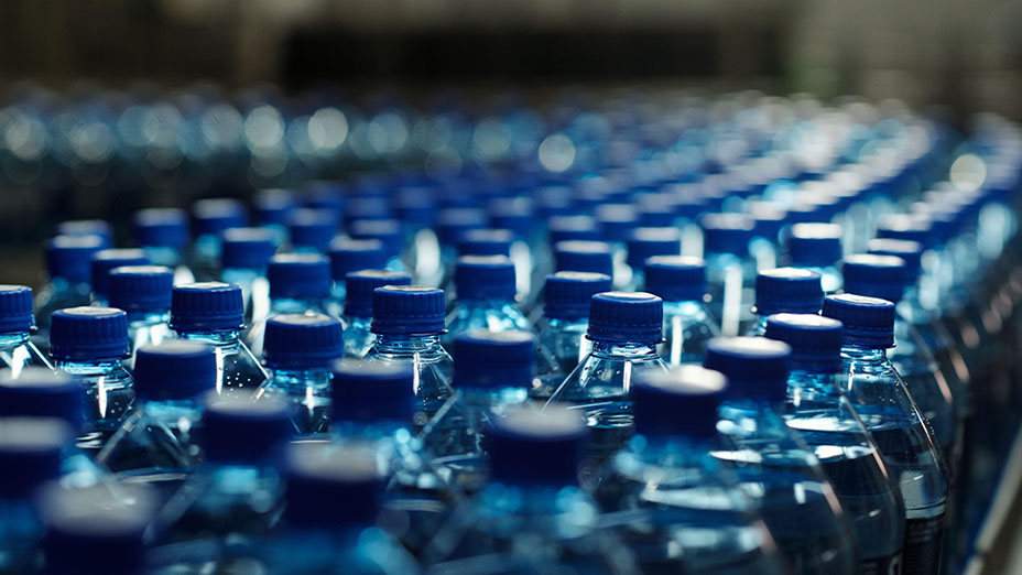 Blue bottles in a factory