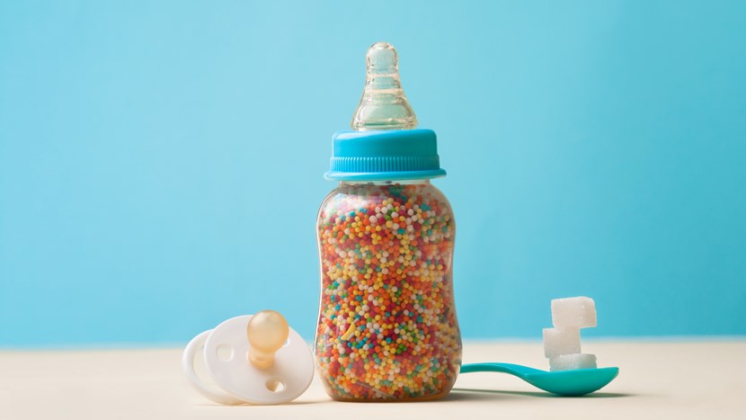 Unhealty baby food concept. Hidden sugar in baby food.