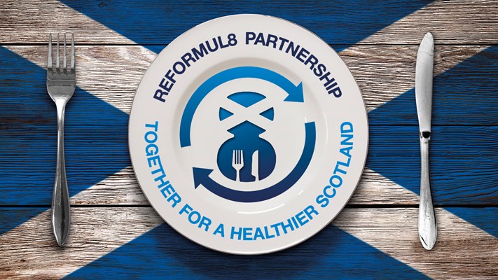 Reformul8 Partnership logo on a plate with Scottish flag