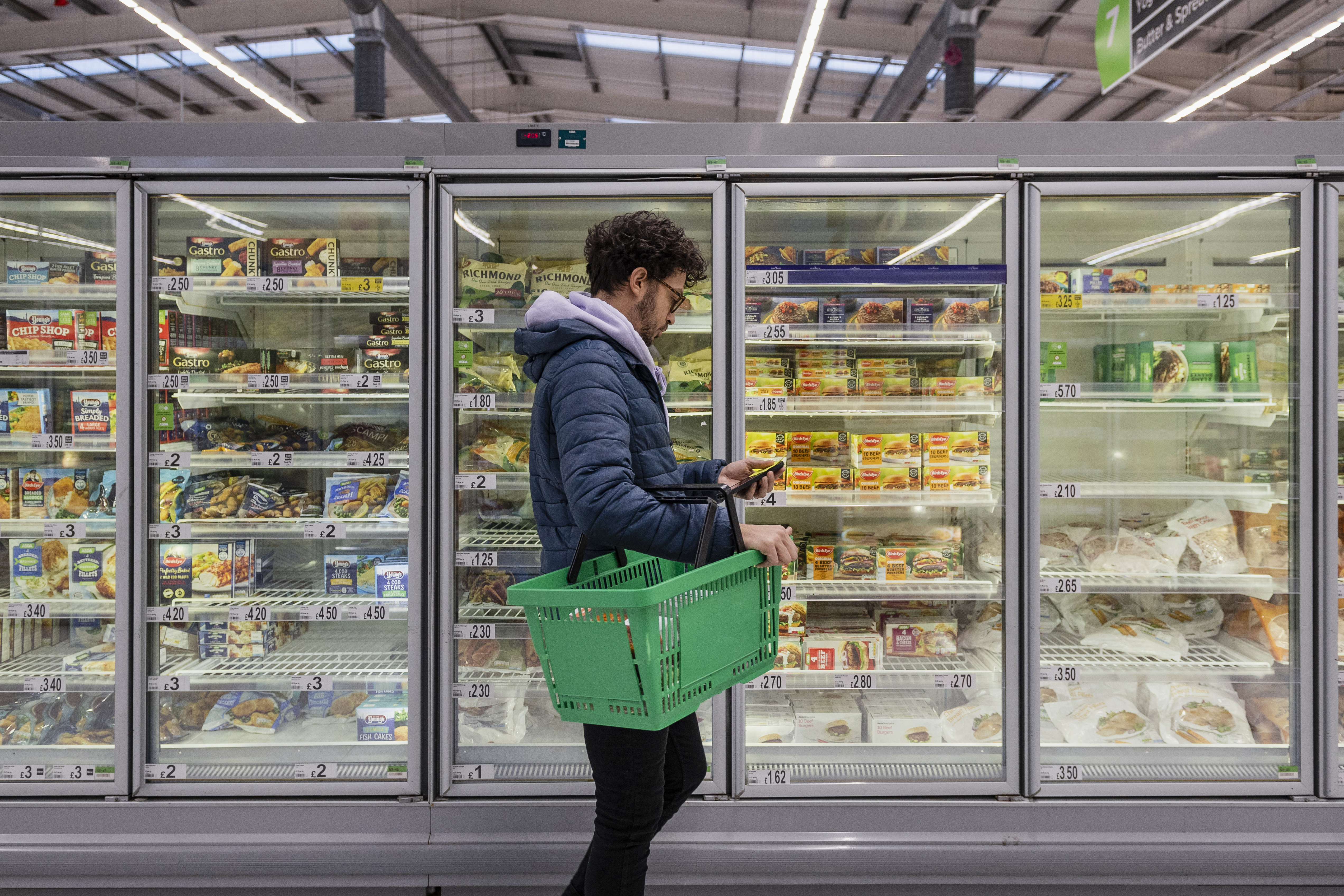 man shoppping in supermarket